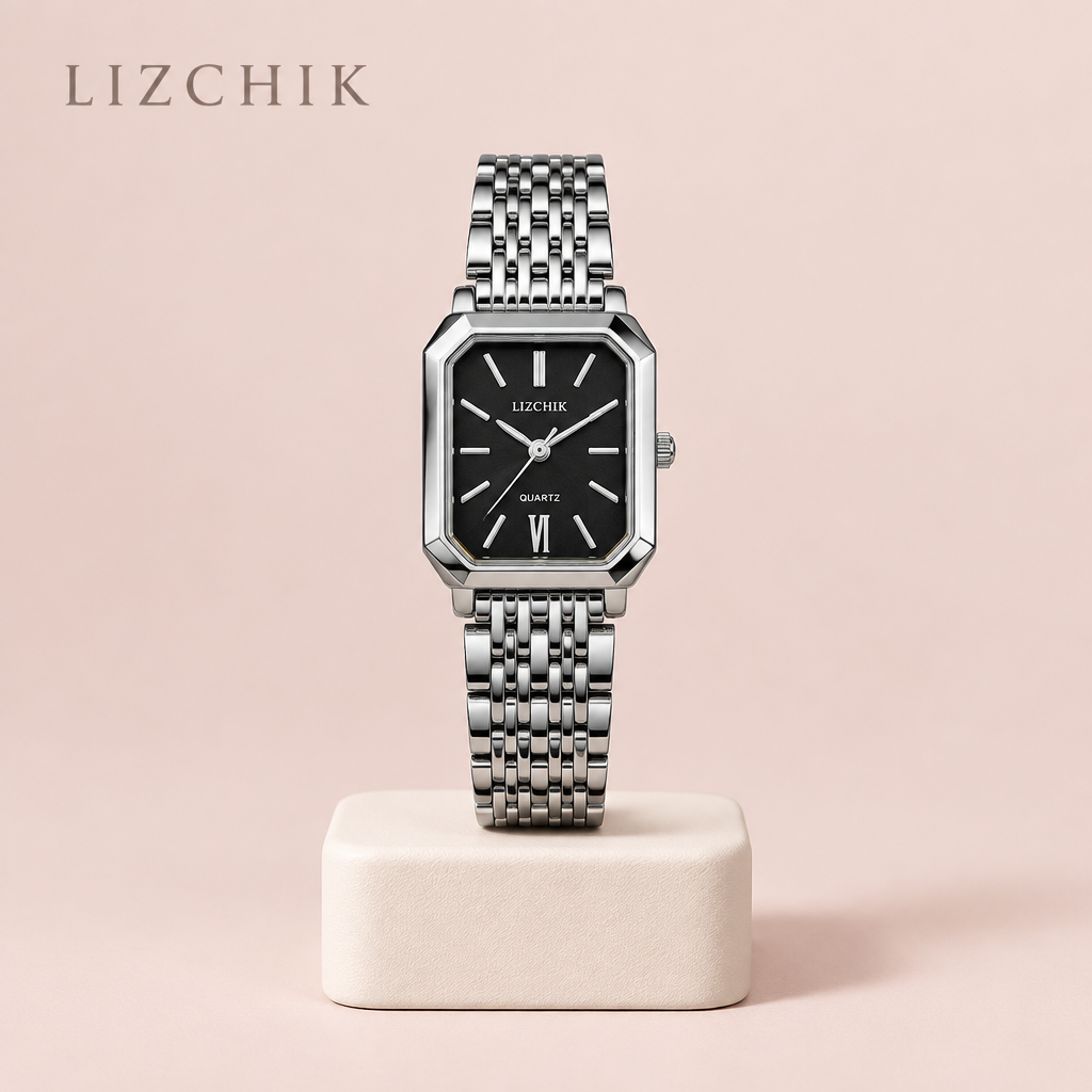 Reloj rectangular plateado con esfera negra